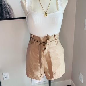 Tan faux leather skirts